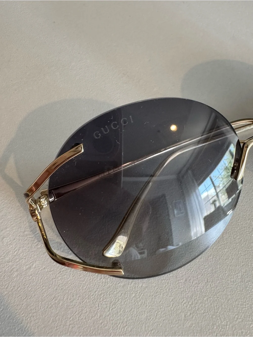 Gucci GG0645S round sunglasses